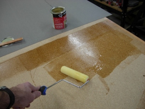 Applying the adhesive with a roller